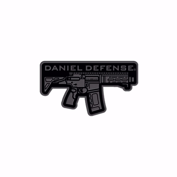 A black PDW patch with a silver machine gun embroided and written Daniel Defense over it