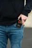 Man putting his phone in his pocket