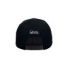 Back of the black hat, with Daniel Defense written in white on the top back