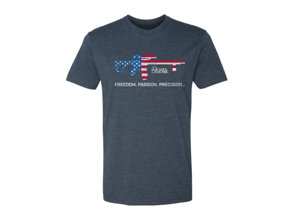 Blue t-shirt with a firearm silhouette with the american flag texture in it. It is written "Freedom. Passion. Precision." in white under the gun