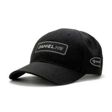 Image of a black hat with gray Daniel Defense patches