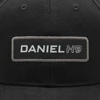 Image of a black hat with gray Daniel Defense patches