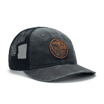 Distressed black hat with a black mesh back and a leather patch with a park scene and a flag and a Daniel Defense logo