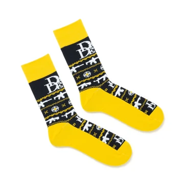 Black and Yellow socks written Daniel Defense in white at the top, and with several images of of firearms over the surface