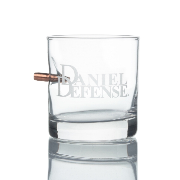 BenShot whiskey glass with a Daniel Defense logo laser engraved on the front with a bullet going through the glass