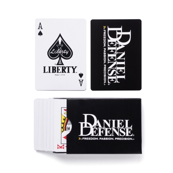 Black playing cards with the Daniel Defense logo and "Freedom Passion Precision" slogon